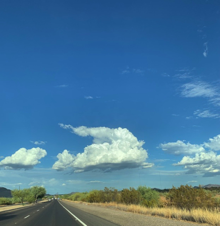 Aug 11 - Carefree Hwy - 
Flat bottom clouds.